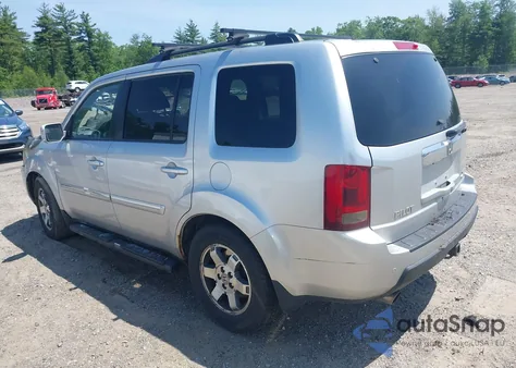 2010 Honda Pilot Touring z USA, uszkodzony, nr VIN 5FNYF4H94AB010058